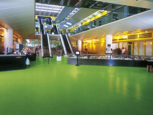 The green flooring is perfectly matching the interior of the building