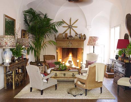 Neat and cozy living room with table, chairs and a fireplace- 20 Decorating Secrets for your Cozy Home