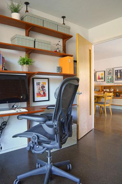 The working desk with high-tech office chair - Eclectic Dallas Home with Mid-Century Interior Design