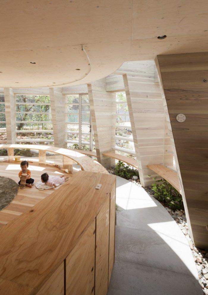 Two kids playing in the kindergarten - Modern Kindergarten Sustainable Architecture Design
