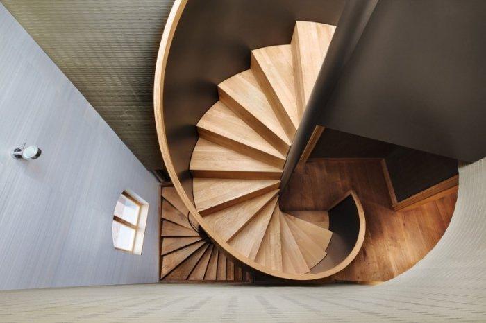 Beautiful wooden spiral staircase - The Contemporary Design of a Three Story Building