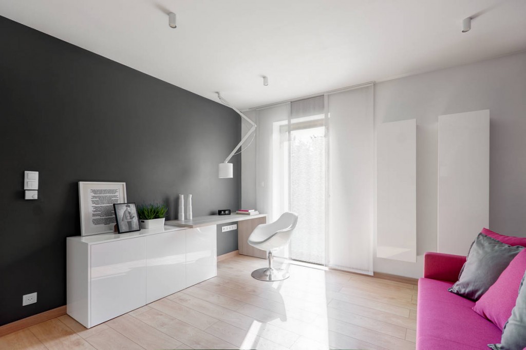 White working desk in a Contemporary Family House in Poland with Minimalist Touch