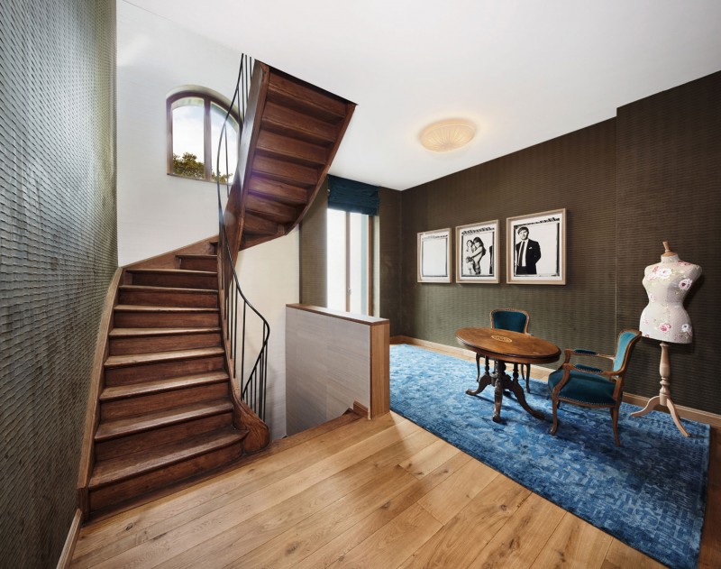 The second floor with small tea table and chairs - The Contemporary Design of a Three Story Building