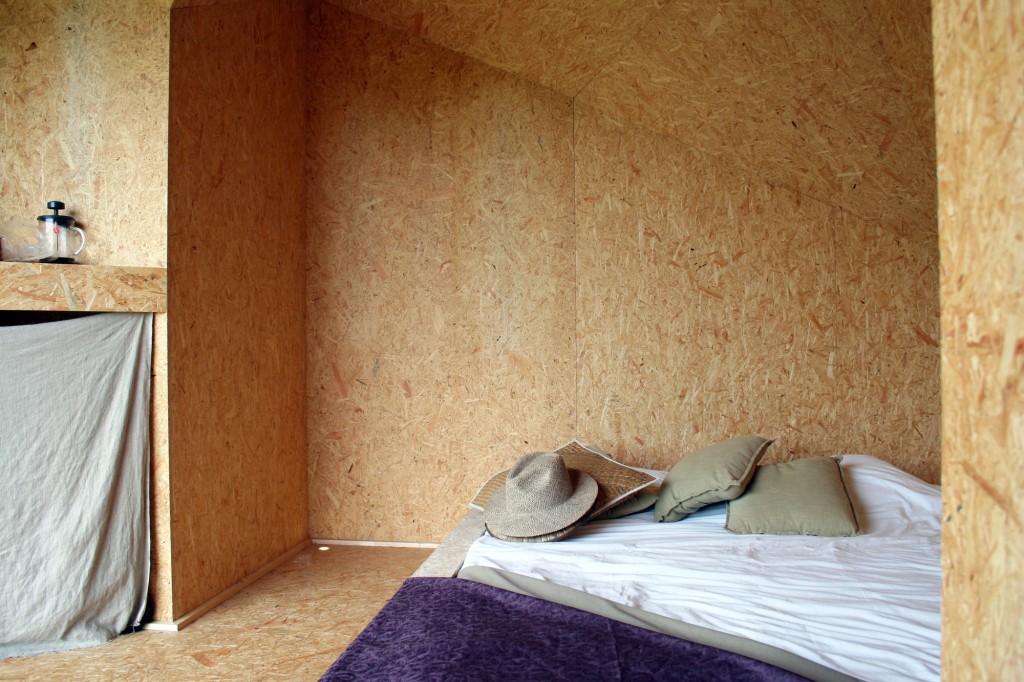 Small wooden retreat interior - The Hermit Houses