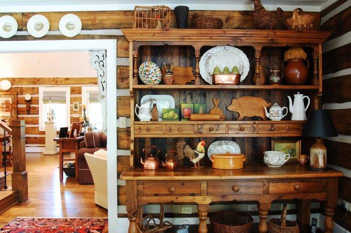Large kitchen hitch with decorations - The Rustic Interior Design of a Mountain Log Cabin in Alabama