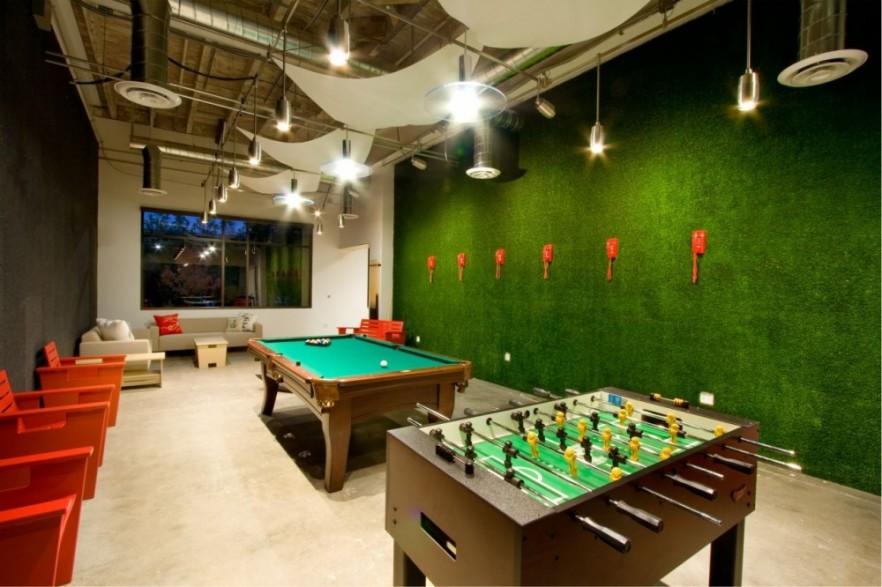 Relax room with football games - Skype HQ's Modern Office in California - by Design Blitz