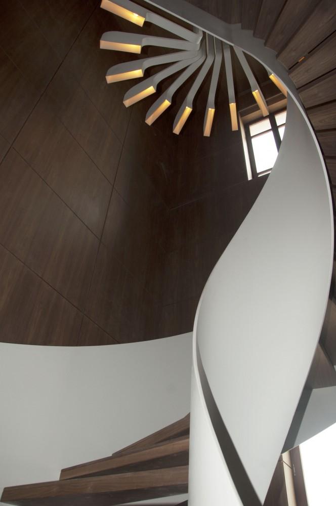 Stylish spiral shape of the staircase by .PSLA
