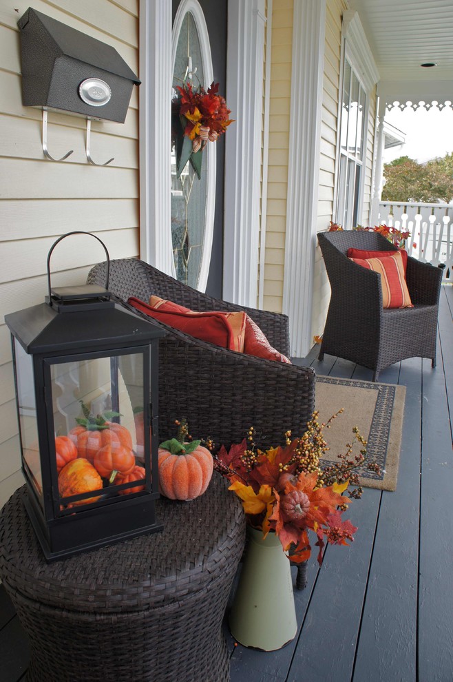 Autumn orange Halloween pumpkins used for the front porch decoration - 36 Ideas for Your Home