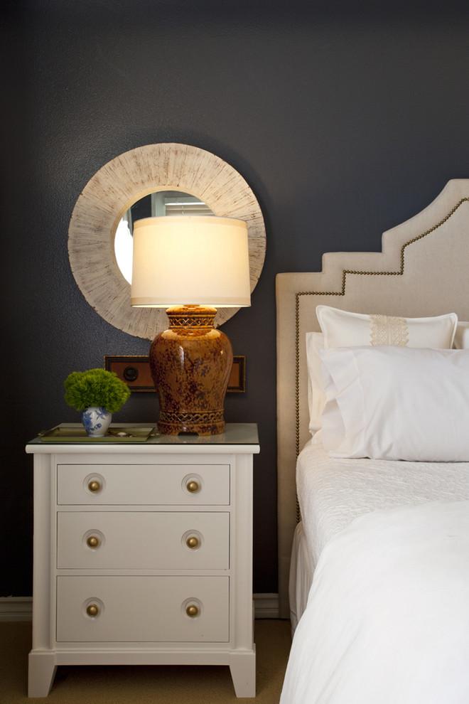 Classic bedside lamp and a mirror behind it - an Eclectic Home in OC