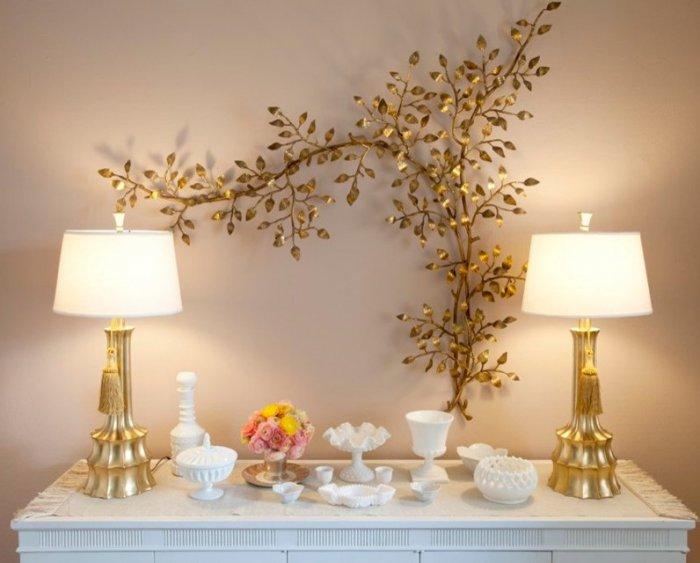 Golden tree branch wall art above a vintage table - an Eclectic Home in OC