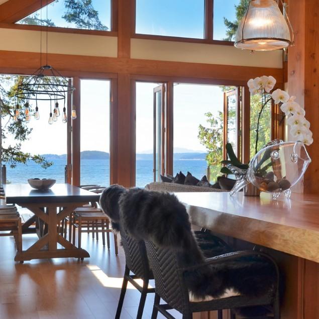The French doors in the living room allow heavenly sceneries over the ocean- The Dream Coastal House