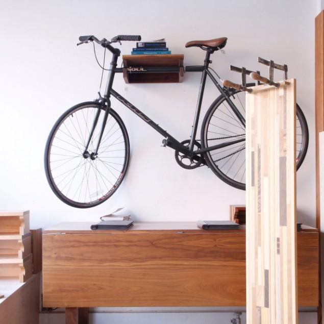 Bicycle placed on a wall bike holder - Living in a Romantic Apartment in Montreal