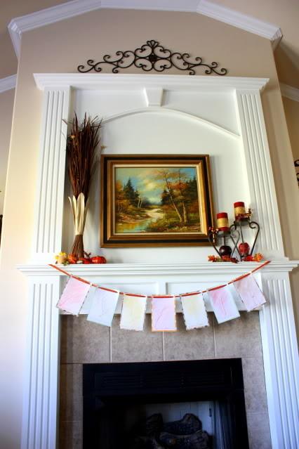 Creative autumn garland placed at the fireplace - 9 Easy DIY Decorating Ideas with Leaves