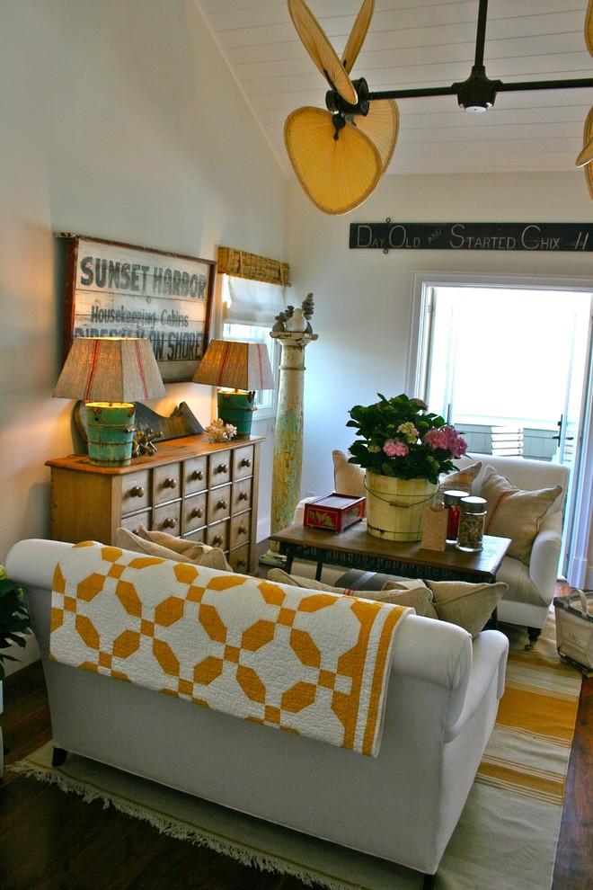 Vintage textiles and antique furniture in a small living room - Beach Family House in Corona Del Mar, CA
