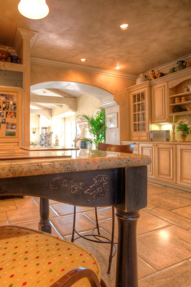 Ultra luxury spacious kitchen with a marble topped dining table - Mansion in California in Italian Style