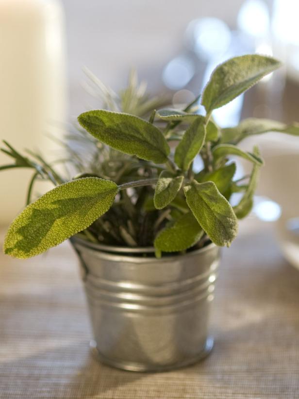 Rosemary and Sage small table centerpiece - 24 Dazzling Settings for a Sparkling Holiday Night