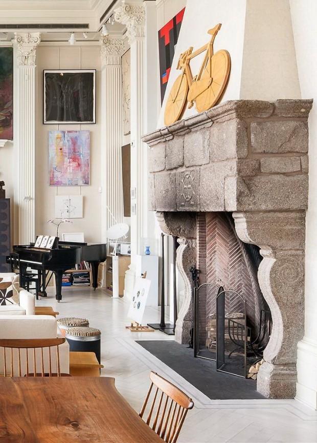 Impressive fireplace made of 17th century stone - $20 Million Luxury and Artful Interior of a New York Loft