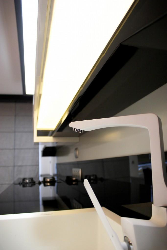 modern kitchen faucet closeup-Interior Design of Apartment in Bulgaria