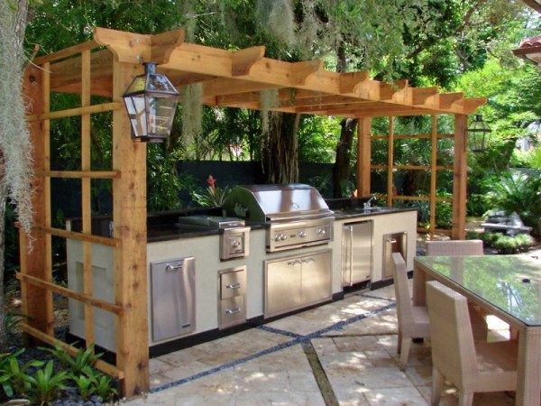 outdoor-kitchen-and-barbecue-under-pergola- 20 Ideas and Examples of Well-Arranged Outdoor Areas