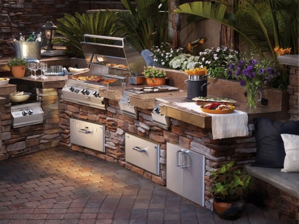 outdoor-kitchen-made-of-stone-and-wood- 20 Ideas and Examples of Well-Arranged Outdoor Areas