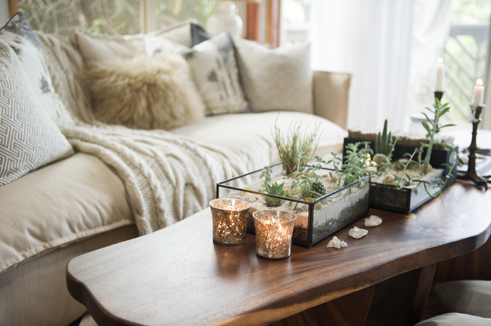 Pot plants decorating natural wooden-colored table - 10 Tips for Creating a Home Paradise in Urban Areas