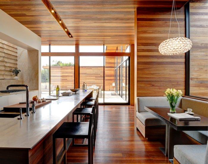 Stylish minimalist luxurious kitchen interior design with a lot of natural light - Mahogany Inspired Expensive House in New York
