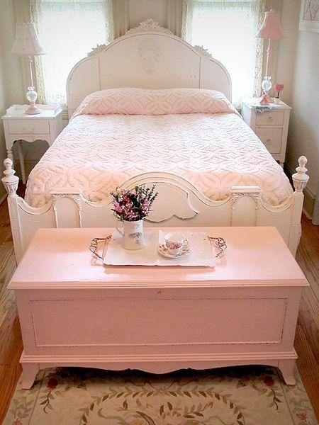 sweet shabby chic bedroom with lovely pink cedar chest and chenille bedspread