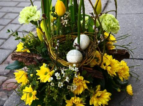 Big Easter basket full of yellow flowers
