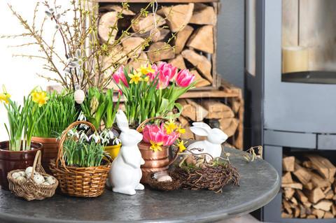 Colorful tulips, Easter baskets and porcelain bunnies