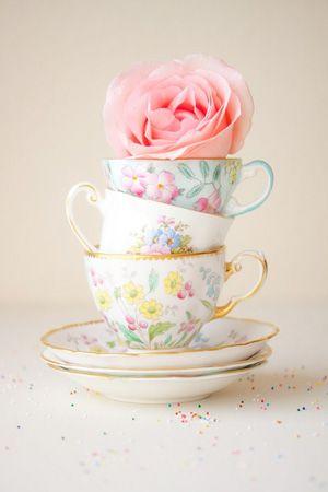 Creative idea for tea cups and a rose blossom at the top