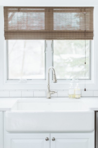 Dream kitchen sink with windows behind it- Eclectic Rustic Cottage Interior with Summer Beach Style Touches