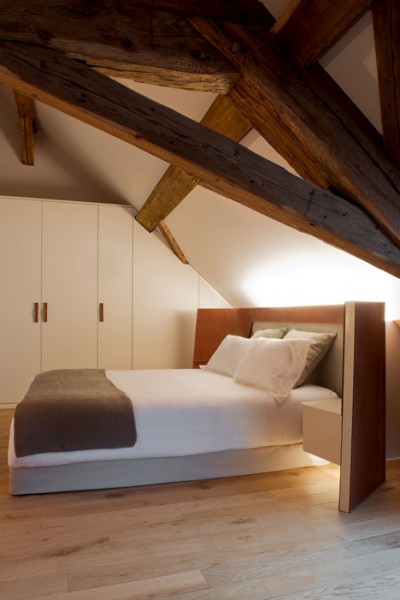 Inside the rustic hotel rooms - trendy commercial interior design with wooden accents
