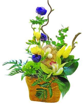Interesting arrangement of a colorful Easter basket