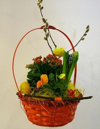 Orange easter basket full of greenery