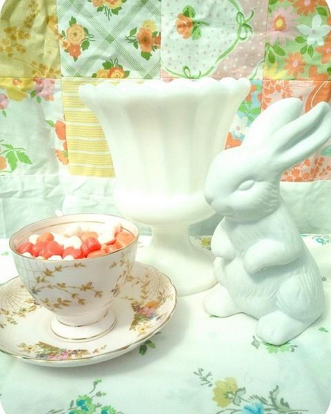 Porcelain bunny and tea cup full of treats