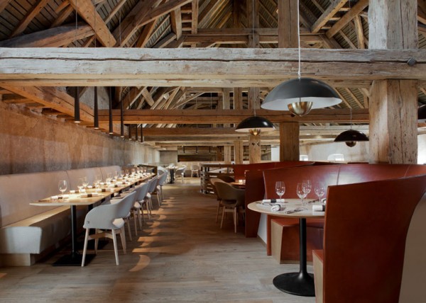 Rustic restaurant with barn beams - trendy commercial interior design with wooden accents