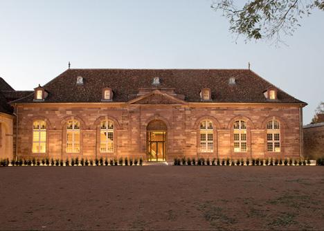 Strasbourg hotel by Jouin Manku - trendy commercial interior design with wooden accents