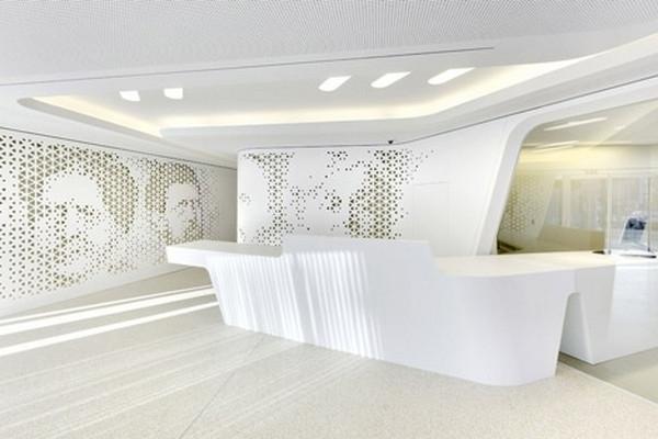 Another_angle_of_the_reception_desk_and_its_clean_curves-Modern Bank Interior Design - Raiffeisen in Zurich