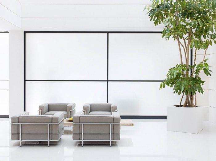 Furniture in grey completes the white theme inside the property