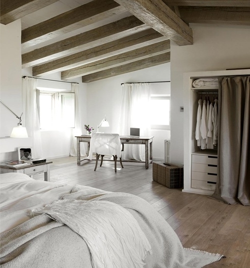 Master bedroom in rustic interior design style with barn beams