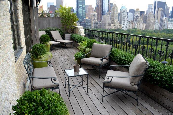 modern balcony in new york with green bushes | | founterior