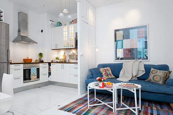 Modern kitchen in a shabby chic open plan living space- Scandinavian Shabby Chic Apartment Interior in Gothenburg