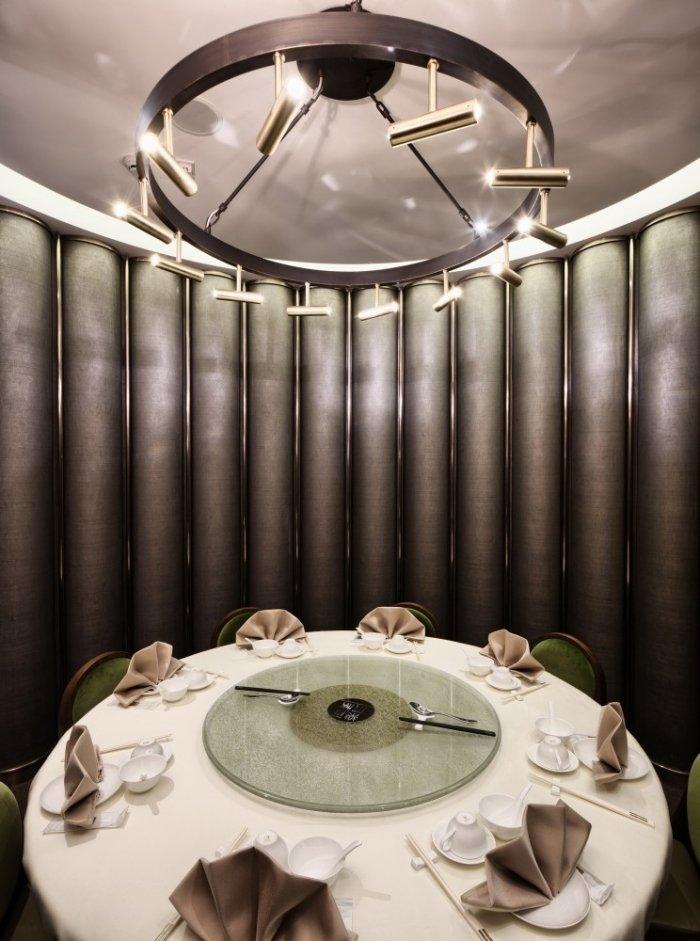 Restaurant architecture - a round table inside a private room with oval shape