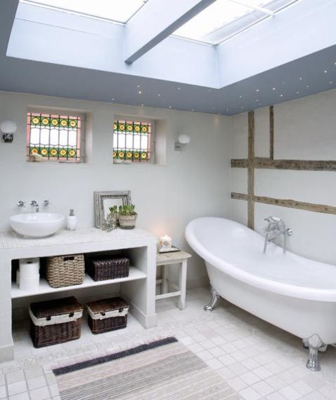 Scandinavian bathroom with white tub