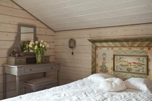 Summer villa - bedroom design with vintage accents like the old-looking desk