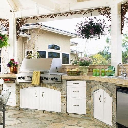 Summer villa - traditional kitchen in white with windows to the front lawn