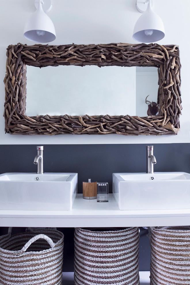 Chic bathroom with creative mirror with wooden knitting frame