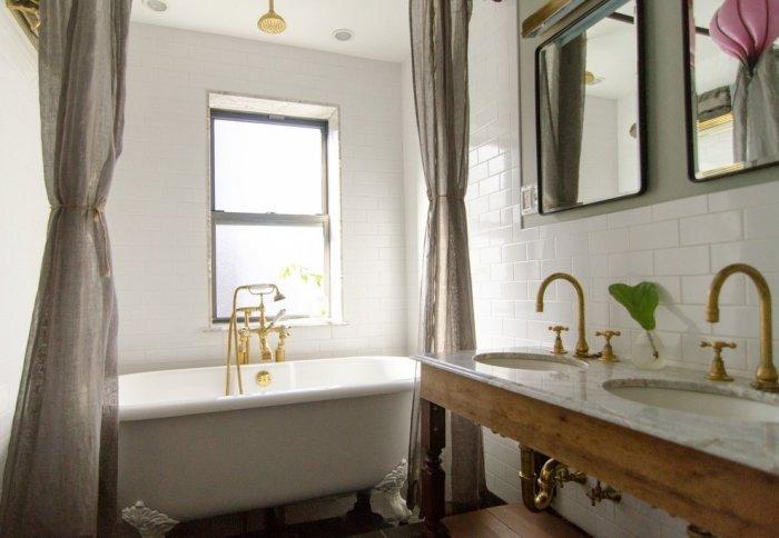 Chic bathroom with vintage sink faucet and marble surface on the top