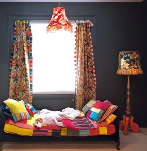 Colorful room with funny bed sheets and curtains