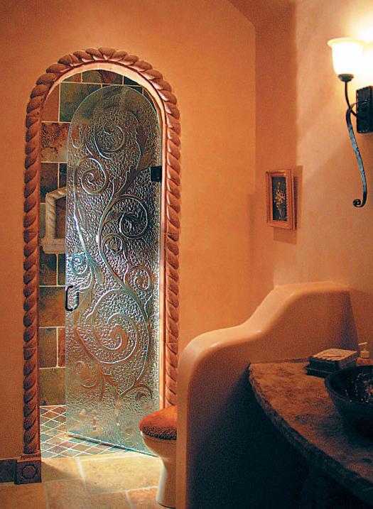 Decorative glass door with beautiful ornaments inside a stylish home
